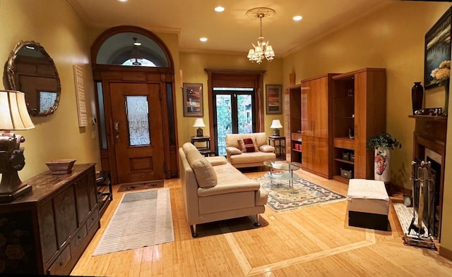 229 W 138th St, New York Manhattan, NY 10030 - foyer featuring light wood-style floors, a chandelier, recessed lighting, and a fireplace