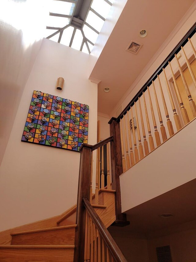 229 W 138th St, New York Manhattan, NY 10030 - staircase with a towering ceiling