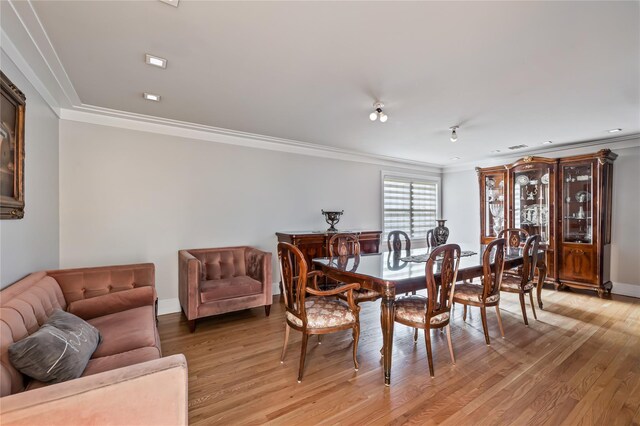 12 Horizon Ct Unit 103, Monsey, NY 10952 - dining space with crown molding, light wood-type flooring, and baseboards