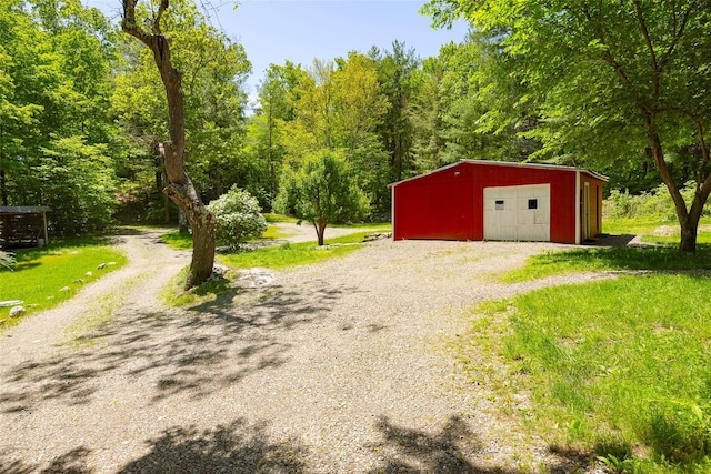 view of outbuilding with driveway