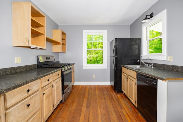 kitchen featuring black appliances, a sink, open shelves, dark countertops, and dark wood-style floors