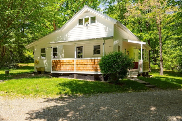 view of front of property with covered porch and ceiling fan