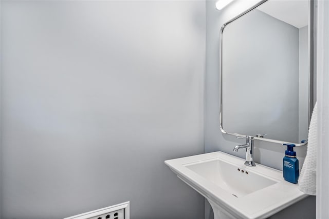 74 Eakins Rd, Manhasset, NY 11030 - bathroom featuring a sink
