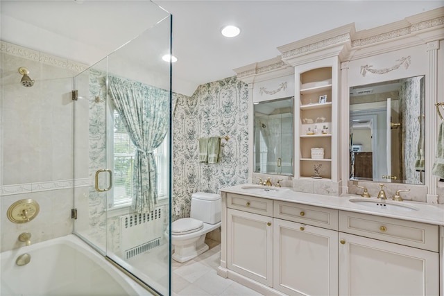 74 Eakins Rd, Manhasset, NY 11030 - bathroom featuring wallpapered walls and double vanity