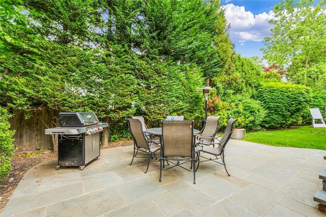 74 Eakins Rd, Manhasset, NY 11030 - view of patio featuring a grill and outdoor dining area