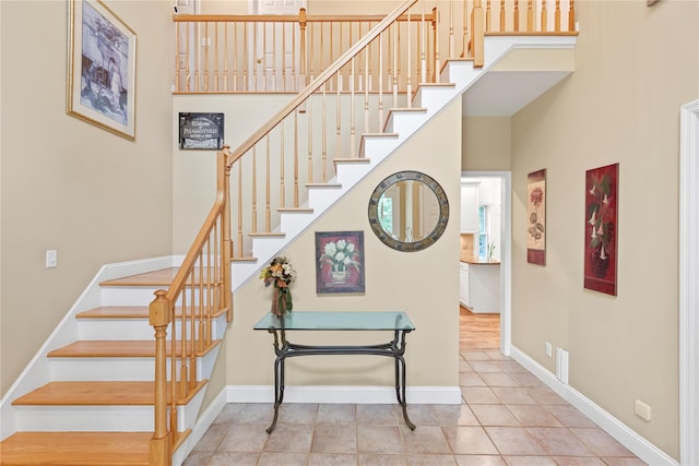 306 Mountain Rd, Pleasantville, NY 10570 - staircase with baseboards and tile patterned floors