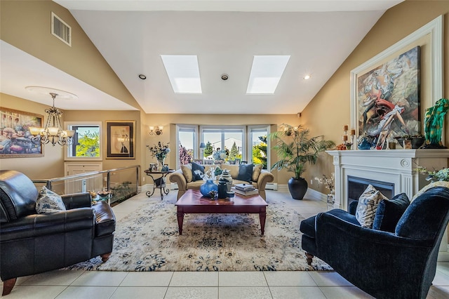 100 Mark Ln, Atlantic Beach, NY 11509 - tiled living room featuring lofted ceiling, a chandelier, a fireplace, healthy amount of natural light, and a skylight