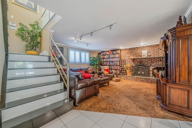 100 Mark Ln, Atlantic Beach, NY 11509 - tiled living area with brick wall, a fireplace, stairs, and track lighting