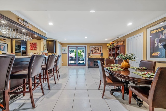 100 Mark Ln, Atlantic Beach, NY 11509 - dining room with ornamental molding, a dry bar, light tile patterned floors, and recessed lighting