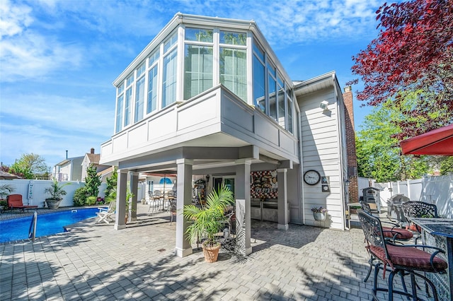 100 Mark Ln, Atlantic Beach, NY 11509 - rear view of property featuring a patio area and a fenced backyard