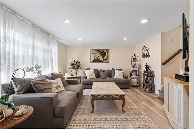 2406 Kayron Ln, North Bellmore, NY 11710 - living room with light wood finished floors and recessed lighting