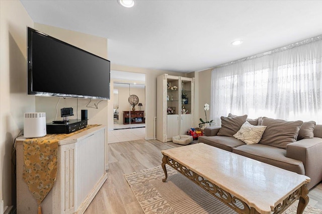 2406 Kayron Ln, North Bellmore, NY 11710 - living area with light wood finished floors and recessed lighting