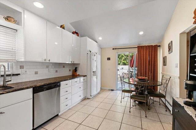 2406 Kayron Ln, North Bellmore, NY 11710 - kitchen featuring dishwasher, a sink, white refrigerator with ice dispenser, white cabinetry, and backsplash