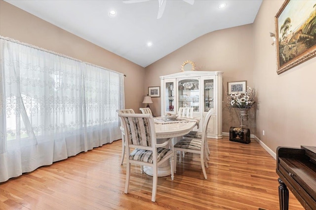 2406 Kayron Ln, North Bellmore, NY 11710 - dining room featuring vaulted ceiling, a ceiling fan, light wood-style flooring, baseboards, and recessed lighting