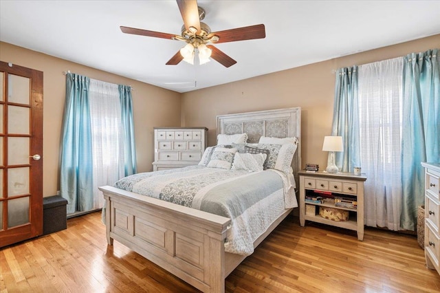 2406 Kayron Ln, North Bellmore, NY 11710 - bedroom with light wood-type flooring and a ceiling fan