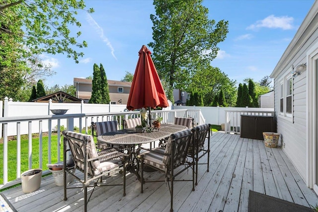2406 Kayron Ln, North Bellmore, NY 11710 - wooden deck with outdoor dining area