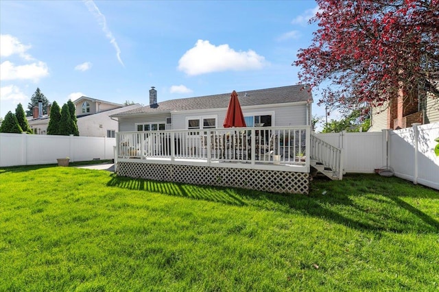 2406 Kayron Ln, North Bellmore, NY 11710 - back of house with a wooden deck and a chimney