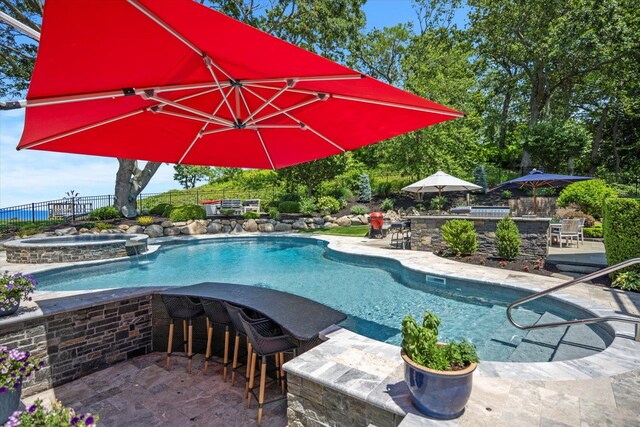 321 Sandpiper Dr, Riverhead, NY 11901 - view of swimming pool featuring a patio area and a pool with connected hot tub