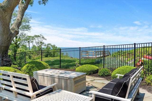 321 Sandpiper Dr, Riverhead, NY 11901 - view of patio featuring a water view and a hot tub
