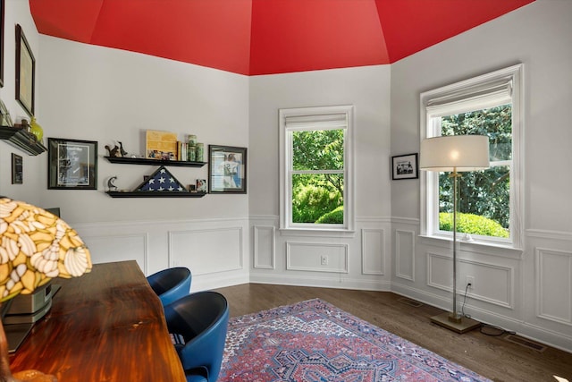 321 Sandpiper Dr, Riverhead, NY 11901 - home office featuring wood finished floors, a wainscoted wall, and vaulted ceiling