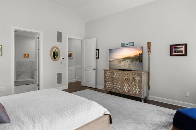 321 Sandpiper Dr, Riverhead, NY 11901 - bedroom with wood finished floors, ensuite bath, and high vaulted ceiling