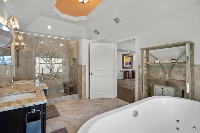 321 Sandpiper Dr, Riverhead, NY 11901 - full bathroom featuring a soaking tub, vanity, tiled shower, recessed lighting, and a tray ceiling