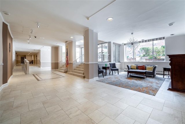 100 Lincoln Ave Unit 4B, Mineola, NY 11501 - community lobby with stairway and recessed lighting