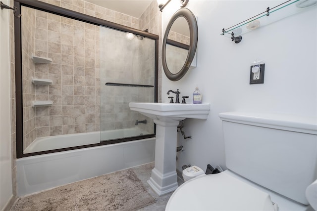 100 Lincoln Ave Unit 4B, Mineola, NY 11501 - bathroom with toilet, combined bath / shower with glass door, and tile patterned floors