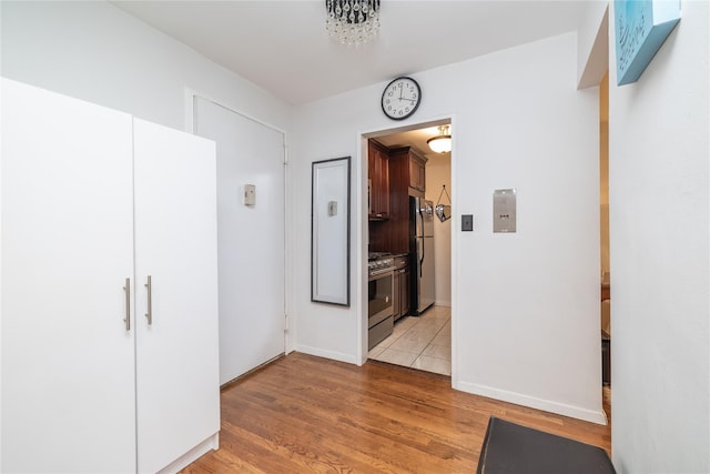 100 Lincoln Ave Unit 4B, Mineola, NY 11501 - corridor featuring light wood-style flooring and baseboards