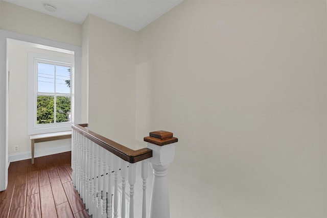 213 Walnut St, Peekskill, NY 10566 - hall with wood finished floors, baseboards, and an upstairs landing