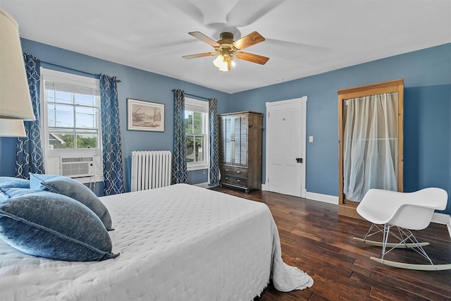 213 Walnut St, Peekskill, NY 10566 - bedroom with radiator, wood finished floors, baseboards, a ceiling fan, and cooling unit