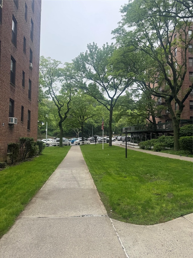 83-85 Woodhaven Blvd Unit 5U, Woodhaven, NY 11421 - view of property's community featuring a yard