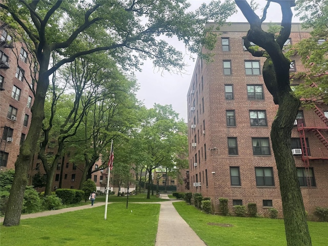 83-85 Woodhaven Blvd Unit 5U, Woodhaven, NY 11421 - view of property's community featuring a yard