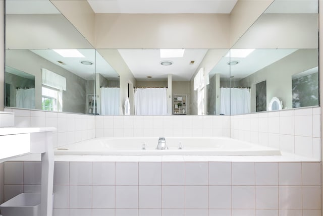 100 Meadow Ridge Ln, Lagrangeville, NY 12540 - full bath featuring vanity, tiled bath, and a shower with shower curtain