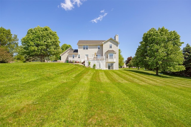 100 Meadow Ridge Ln, Lagrangeville, NY 12540 - back of property featuring a chimney and a lawn