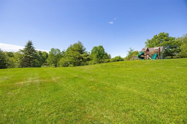 100 Meadow Ridge Ln, Lagrangeville, NY 12540 - view of grassy yard with a playground