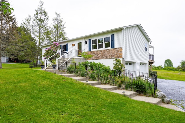 186 Oswego Rd, Pleasant Valley, NY 12569 - view of front of property with stone siding, an attached garage, and asphalt driveway