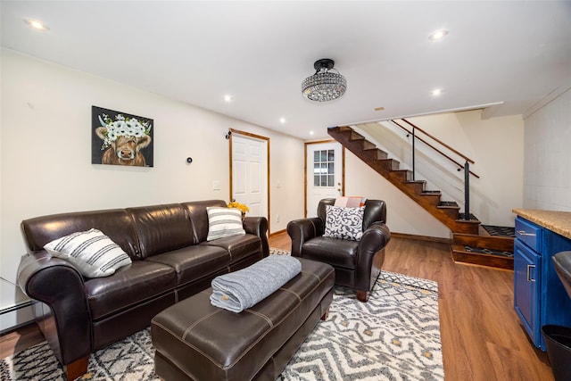 186 Oswego Rd, Pleasant Valley, NY 12569 - living area with light wood-style floors, stairway, recessed lighting, and baseboard heating
