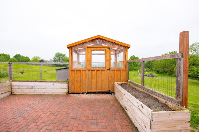 186 Oswego Rd, Pleasant Valley, NY 12569 - view of outdoor structure with a vegetable garden
