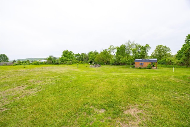 186 Oswego Rd, Pleasant Valley, NY 12569 - view of grassy yard with an outbuilding