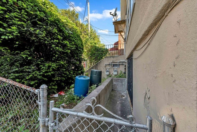 3038 Tiemann Ave, Bronx, NY 10469 - view of side of home with stucco siding