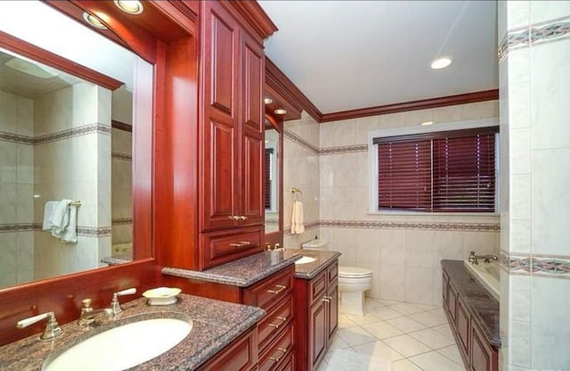 10 Colonial Dr, Smithtown, NY 11787 - full bathroom with vanity, a garden tub, tile patterned flooring, tile walls, and toilet