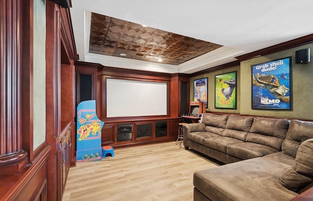 10 Colonial Dr, Smithtown, NY 11787 - cinema room featuring crown molding, light wood-type flooring, and a raised ceiling