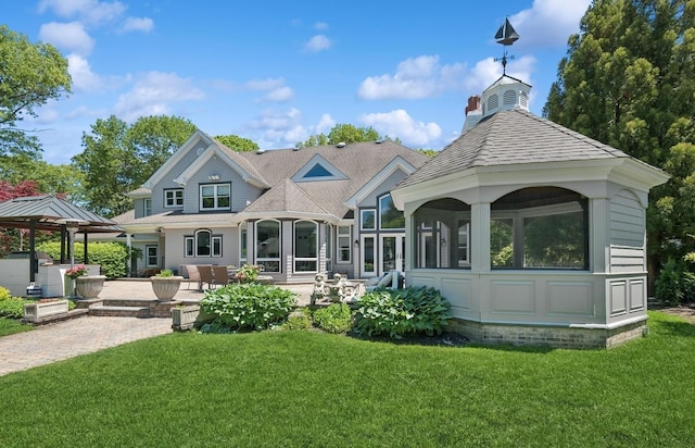 10 Colonial Dr, Smithtown, NY 11787 - rear view of property featuring a gazebo, a yard, a patio area, and a chimney
