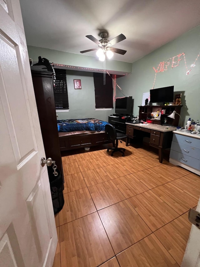 3239 Barker Ave Unit L J, Bronx, NY 10467 - bedroom featuring an office area, ceiling fan, and light wood-type flooring