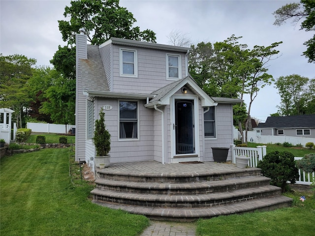 115 Dawn Rd, Rocky Point, NY 11778 - view of front of house with a chimney
