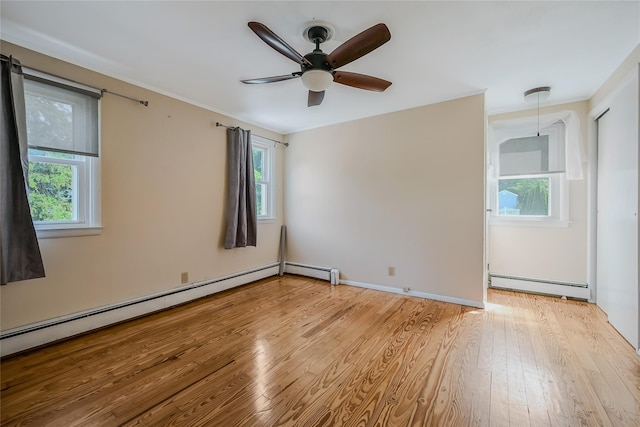 115 Dawn Rd, Rocky Point, NY 11778 - unfurnished room with a baseboard heating unit, light wood-type flooring, and ceiling fan