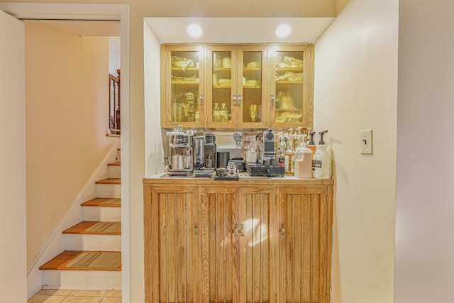 216 Birch Dr, New Hyde Park, NY 11040 - indoor bar with stairs and light tile patterned floors