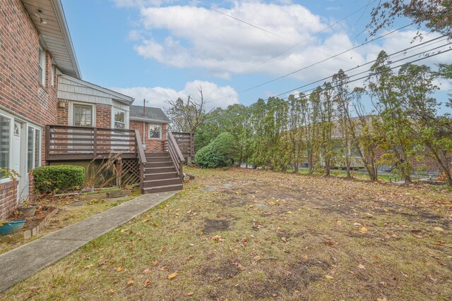 216 Birch Dr, New Hyde Park, NY 11040 - view of yard featuring a deck and stairway