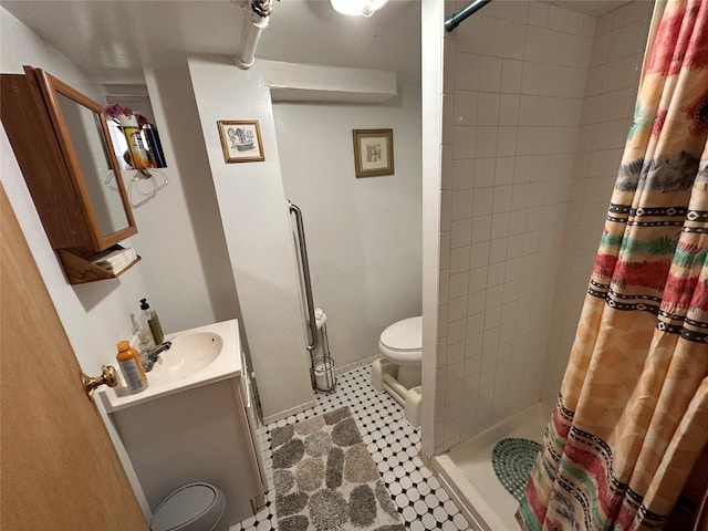 65 Stephen Pl, Valley Stream, NY 11580 - full bathroom featuring a shower stall, vanity, and toilet